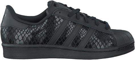 adidas schoenen met swarte print|Zwarte dameslaarzen .